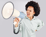 Megaphone, protest and black woman shouting in studio isolated on white background. Screaming, angry and person with loudspeaker protesting for human rights, change or justice, announcement or speech