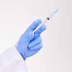 Healthcare, hand and doctor with vaccine, injection or shot in studio against a white background. Medicine, vaccination and man health expert with needle for medical, innovation or disease treatment