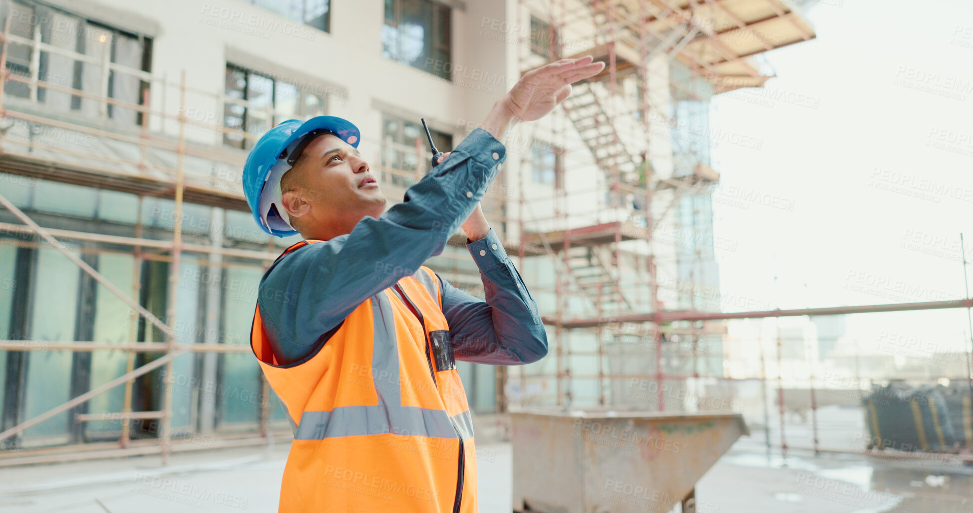 Buy stock photo Construction worker, radio communication and a man professional contractor on site for industrial architecture. Project management, engineer and professional builder working on a building site