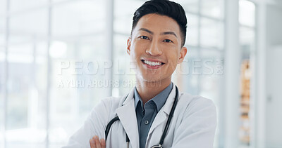 Buy stock photo Medical, asian man and portrait of surgeon in hospital for healthcare career in medicine or surgery in a clinic. Confident, happy and young doctor, expert or medicare professional ready for surgery