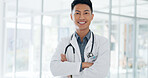Asian man, face and doctor smile for healthcare, vision or career ambition and advice at the hospital. Portrait of happy and confident Japanese medical expert smiling, phd or medicare at the clinic