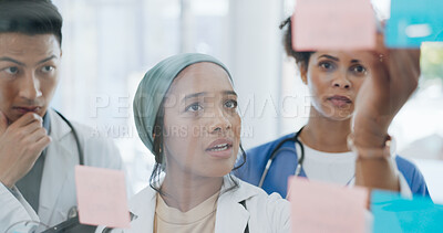 Buy stock photo Doctor, people and meeting in schedule planning, brainstorming or tasks on glass board at hospital. Group of medical or healthcare workers in teamwork, plan or ideas for surgery or strategy at clinic