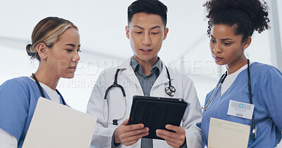 Buy stock photo Doctors, nurse and meeting with tablet in hospital for healthcare review, telehealth analysis or support in clinic. Medical team, asian surgeon and discussion on digital tech for planning information