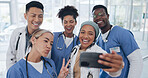 Doctors, team and selfie with diversity and health group, happiness with collaboration and smartphone photography. Medical professional, happy in picture and people in medicine with peace hand sign