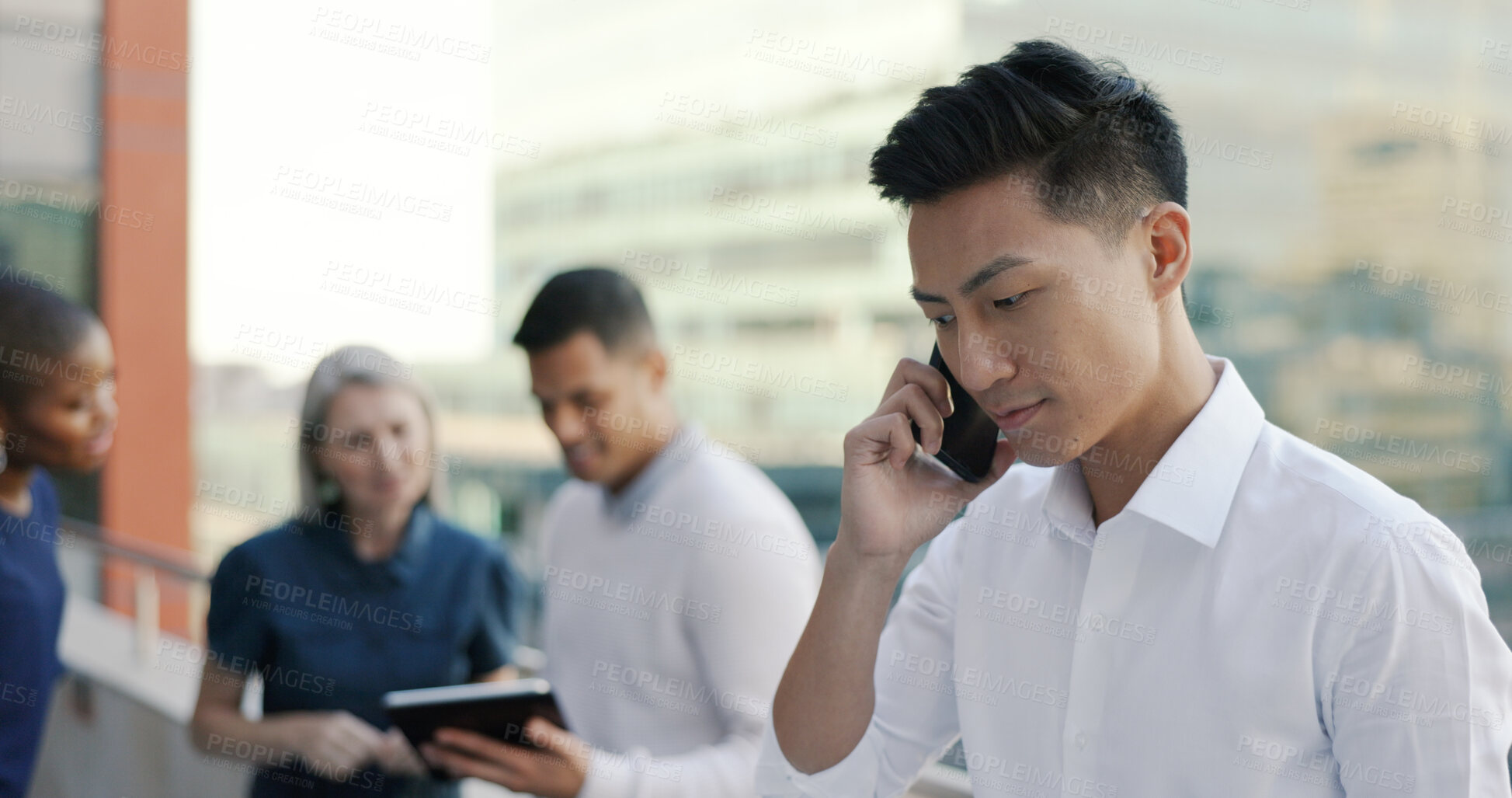 Buy stock photo Asian man, phone call on office building balcony for communication and connection in business negotiation. City, terrace and businessman with cellphone discussion for deal, consulting and networking.