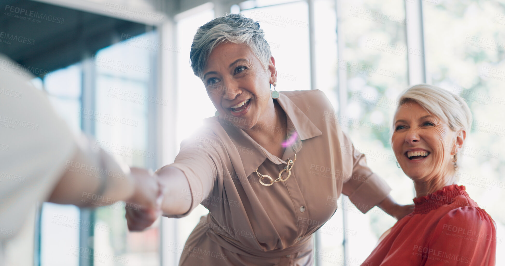 Buy stock photo Meeting, handshake and women with collaboration, opportunity and negotiation for growth, development or happiness. Female people, coworkers or staff shaking hands, partnership or welcome with support