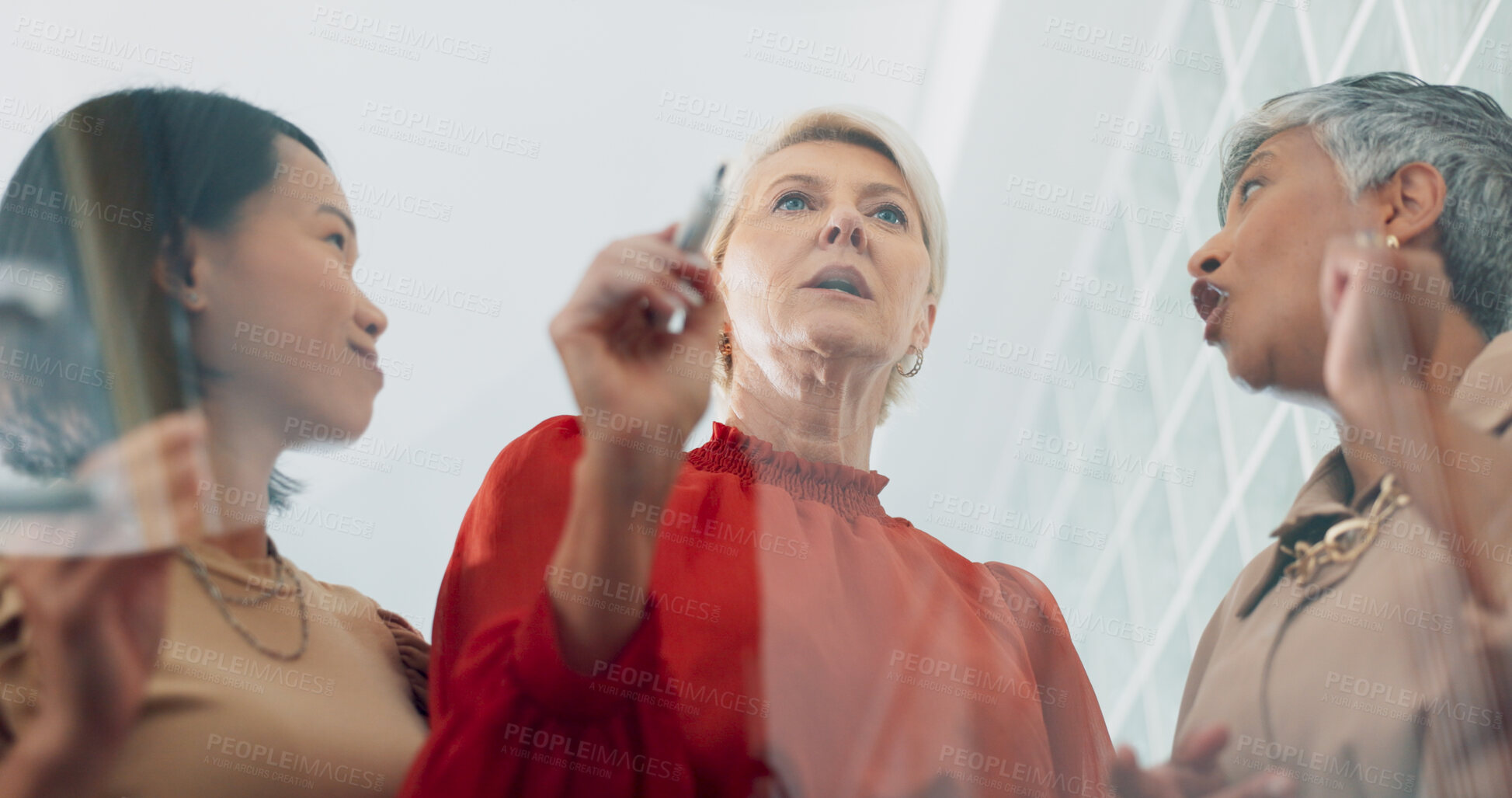 Buy stock photo Business people, writing and teamwork in brainstorming, tasks or schedule planning on glass board at office. Group of women in team project plan or agenda for corporate strategy or ideas at workplace