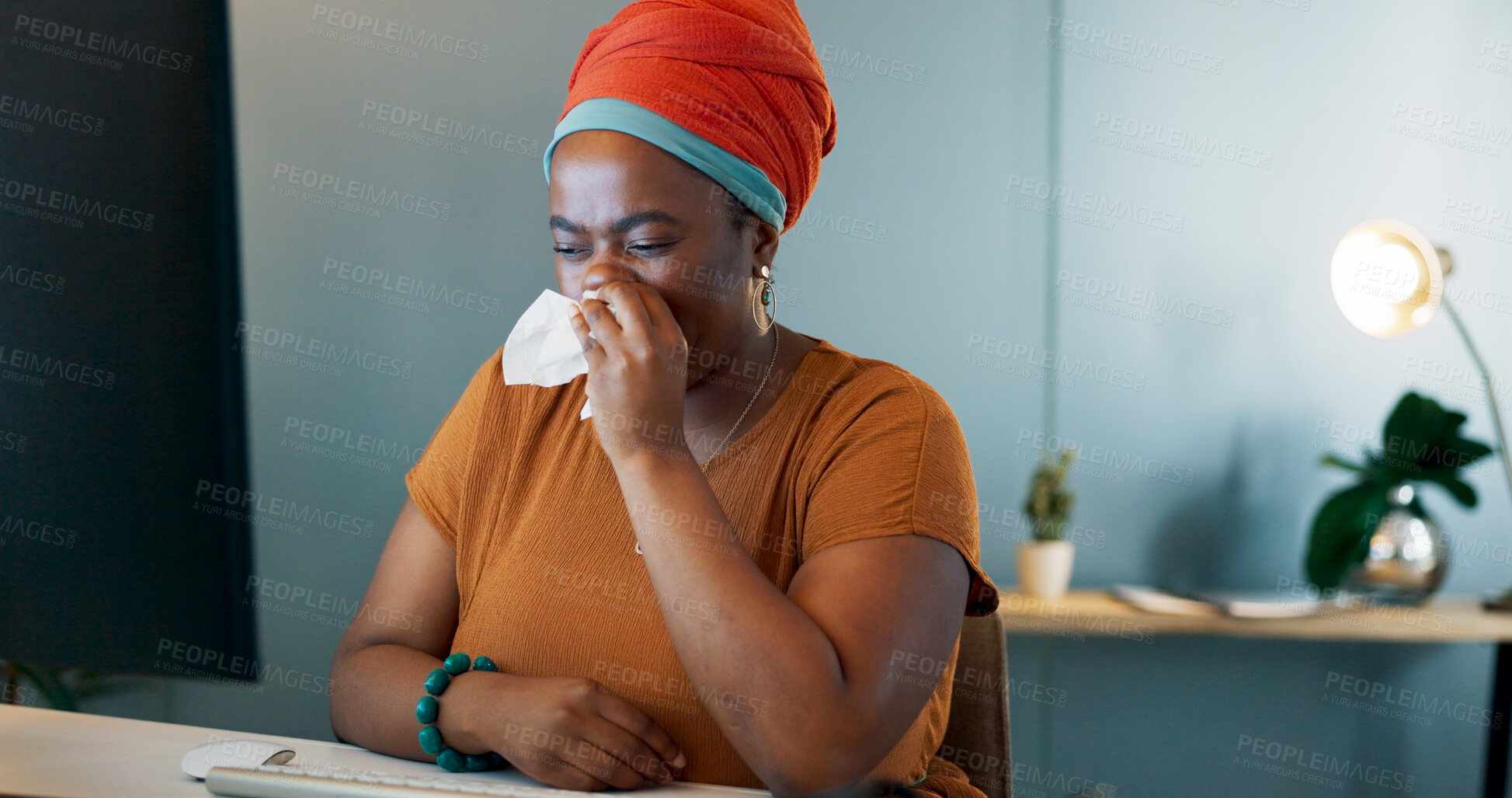 Buy stock photo Sick business woman blowing nose at computer for allergies, virus and working late in office. African worker, sneeze and infection of influenza, cold bacteria or risk of health, sinusitis or hayfever