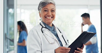 Buy stock photo Senior woman, portrait smile and doctor in healthcare, career ambition or documents at hospital. Happy mature female person, medical professional or manager with clipboard in leadership at clinic