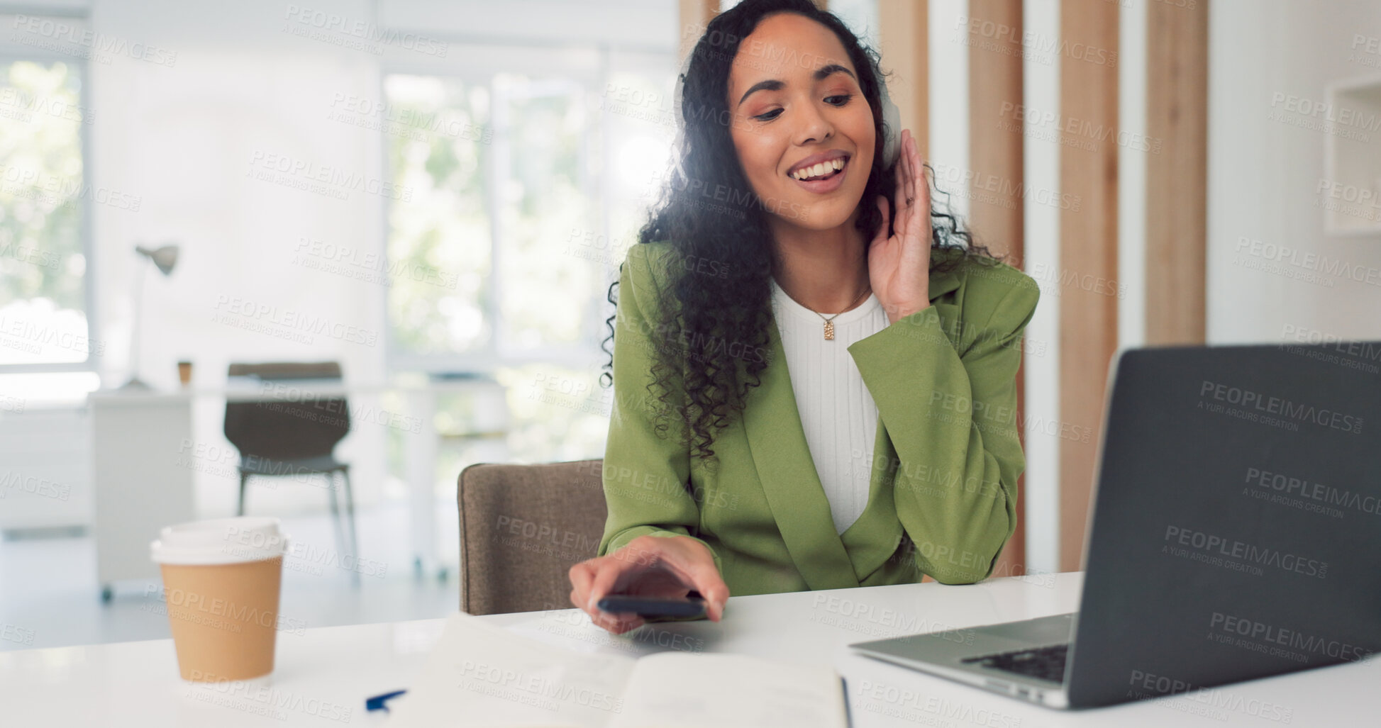 Buy stock photo Happy woman, laptop and headphones listening to music in relax with phone at office desk. Female person or employee smile with computer, smartphone or headset in audio streaming or sound at workplace