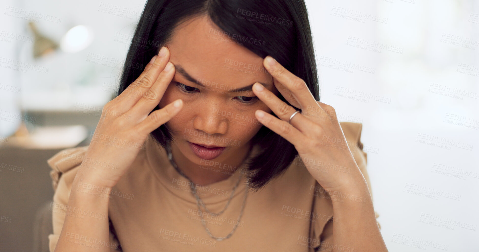 Buy stock photo Anxiety, headache and asian woman at job in office working at a company. Tired business worker, burnout and career mistake with stress, deadline fear and depression of pain, crisis and doubt