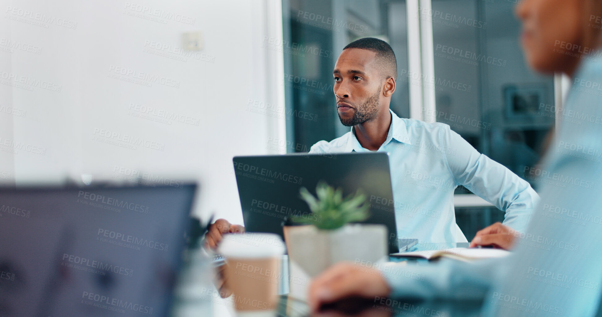 Buy stock photo Teamwork, black man or business people in meeting on laptop for analytics, planning or research. Project management, discussion or group collaboration on tech for communication, feedback or review