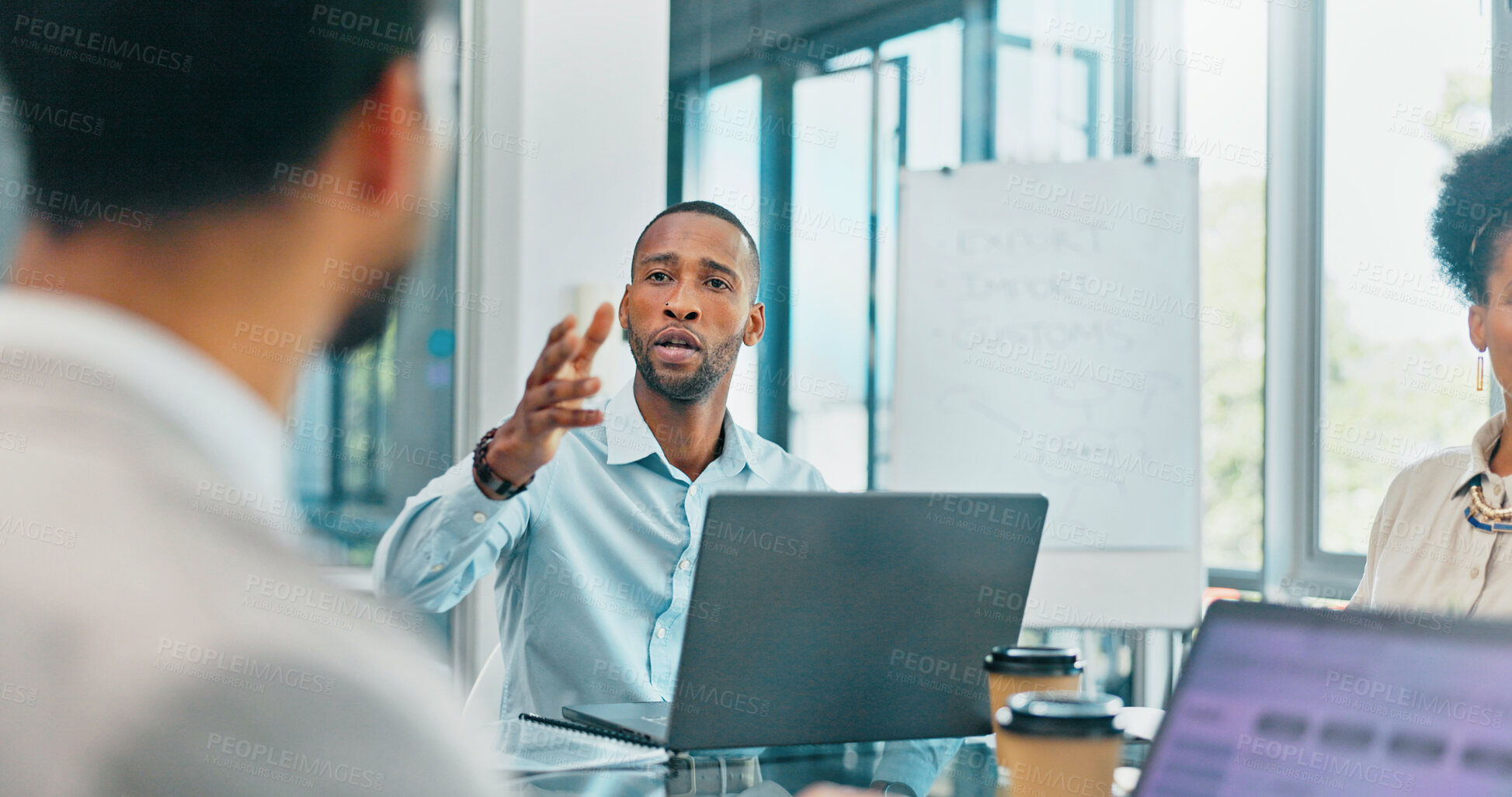 Buy stock photo Review, black man or business people in meeting on laptop for analytics, planning or research. Project management, teamwork or group collaboration on tech for agenda, discussion or team feedback