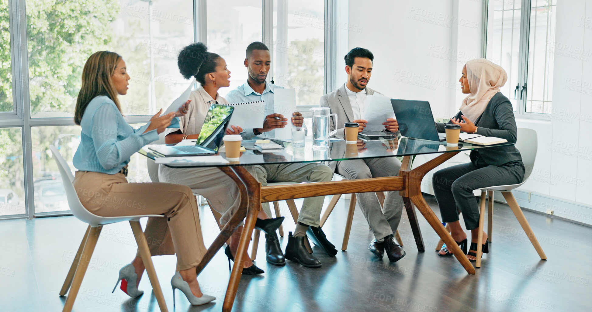 Buy stock photo Meeting, teamwork and planning with a group of business people in a boardroom together for strategy. Collaboration, technology or diversity with an employee team in an office for game plan discussion