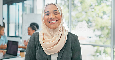 Face, muslim and mindset with a business woman in her office at work wearing a hijab for religion or faith. Portrait, vision and smile with an islamic female employee standing in her workplace