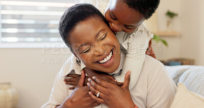 Love, mother and excited child hug playing together bonding in bedroom at house. Happy black woman and baby affection smile, trust and support care or enjoy spending quality time at family home
