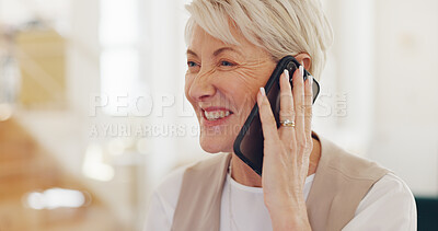Senior woman, work and home with phone call, communication and laptop on desk for online crm job. Mature worker, home office and using phone for conversation, discussion or negotiation with client