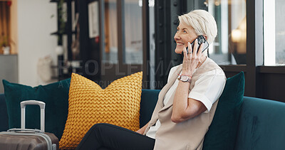 Phone call, travel and business woman in lobby for global networking, customer service and hospitality check, review or update. Smartphone, success and senior ceo or boss talking on sofa in a hotel