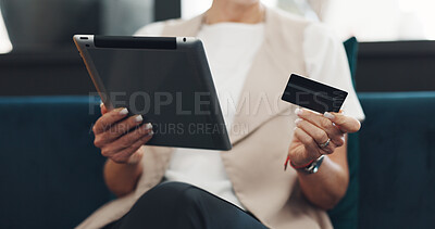 Woman, tablet and credit card for ecommerce, online shopping and paying bills while on a couch reading details or information for payment. Hands of female doing online banking with wifi network