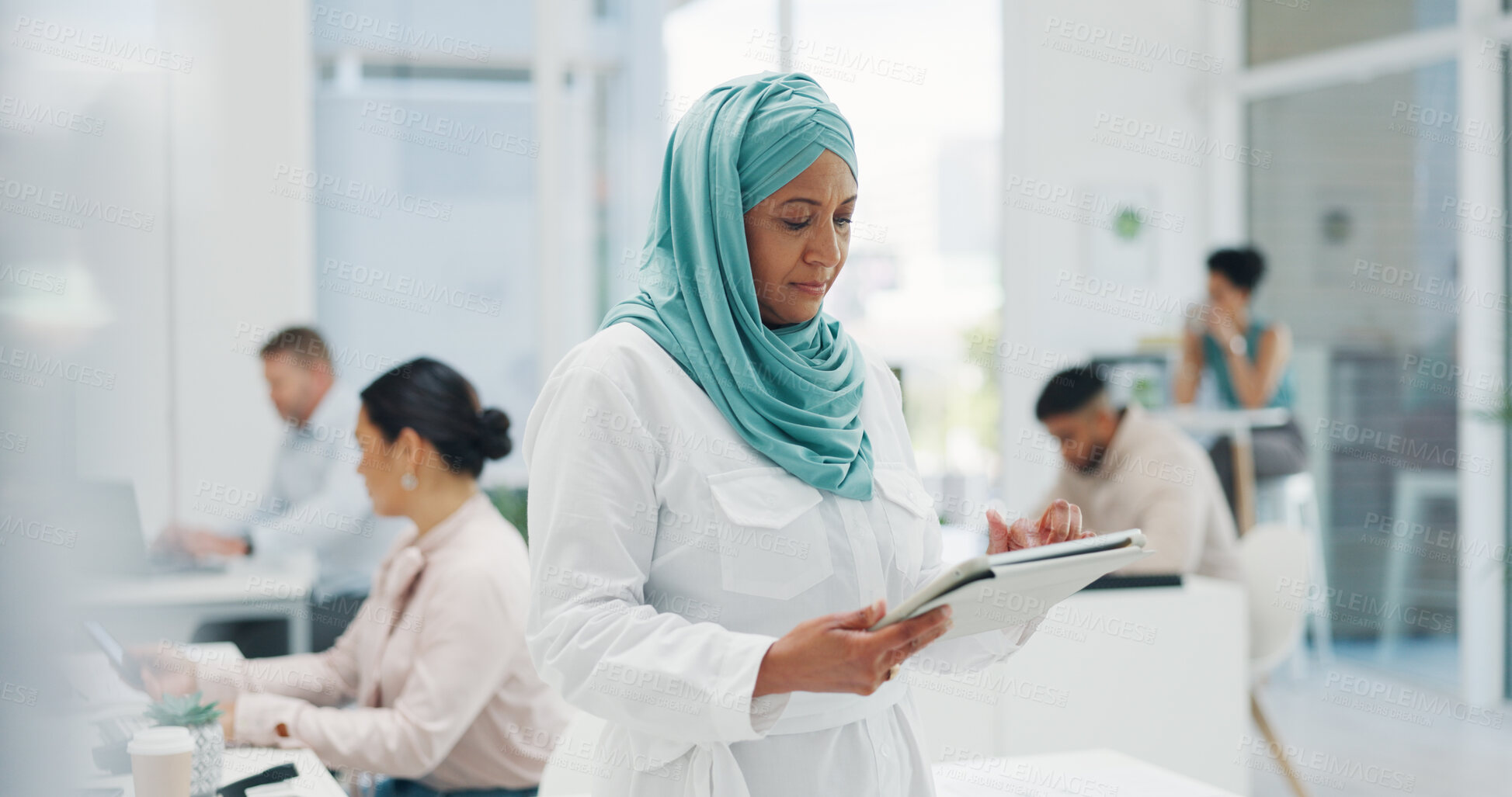 Buy stock photo Muslim woman, tablet and hijab in research, communication or networking for schedule planning at office. Islam, female person or creative employee working on technology for online strategy or startup
