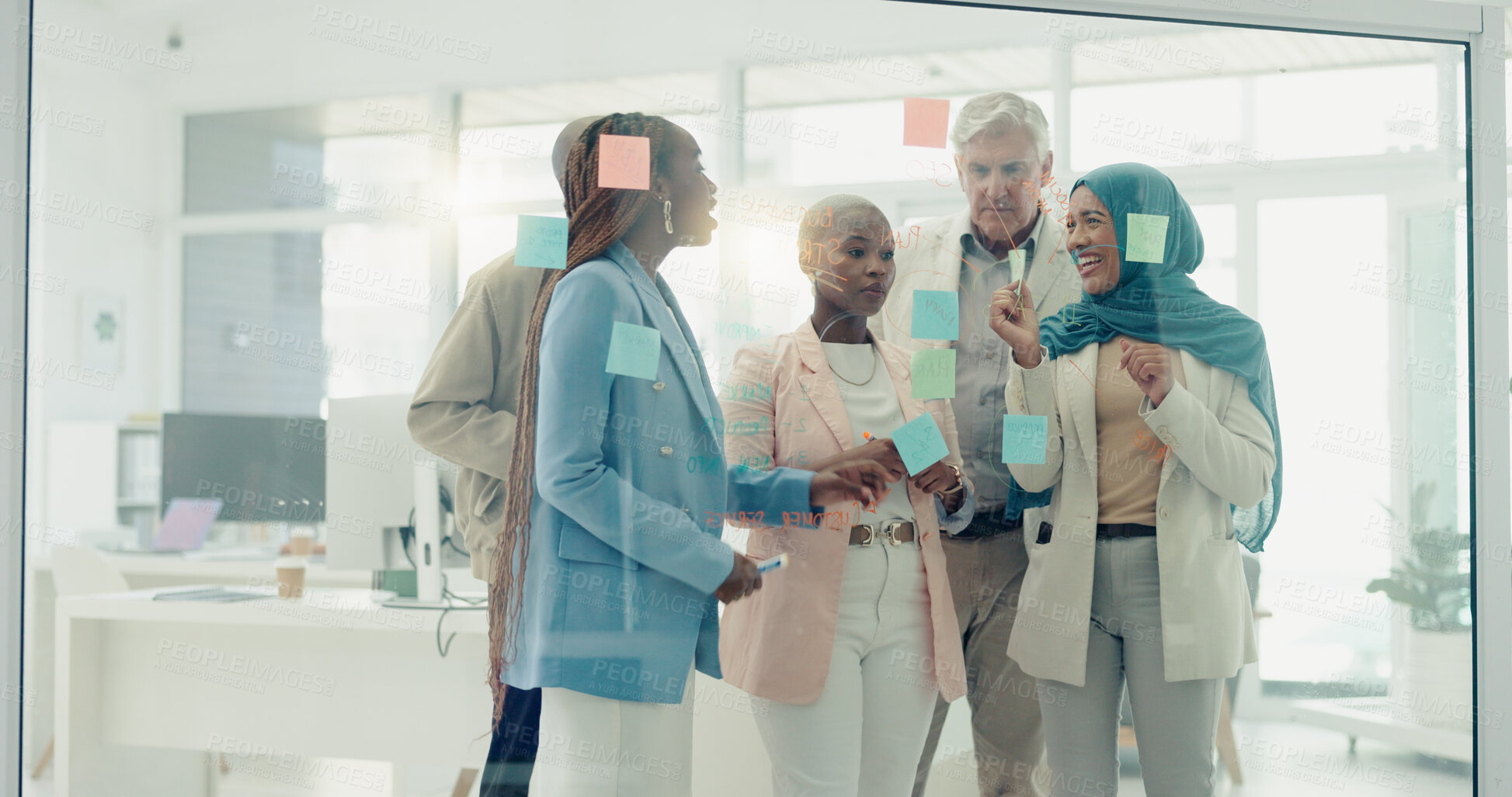 Buy stock photo Meeting, teamwork and sticky notes on glass in the office with a business team talking about strategy. Collaboration, planning and coaching with a black woman leader teaching her staff at work