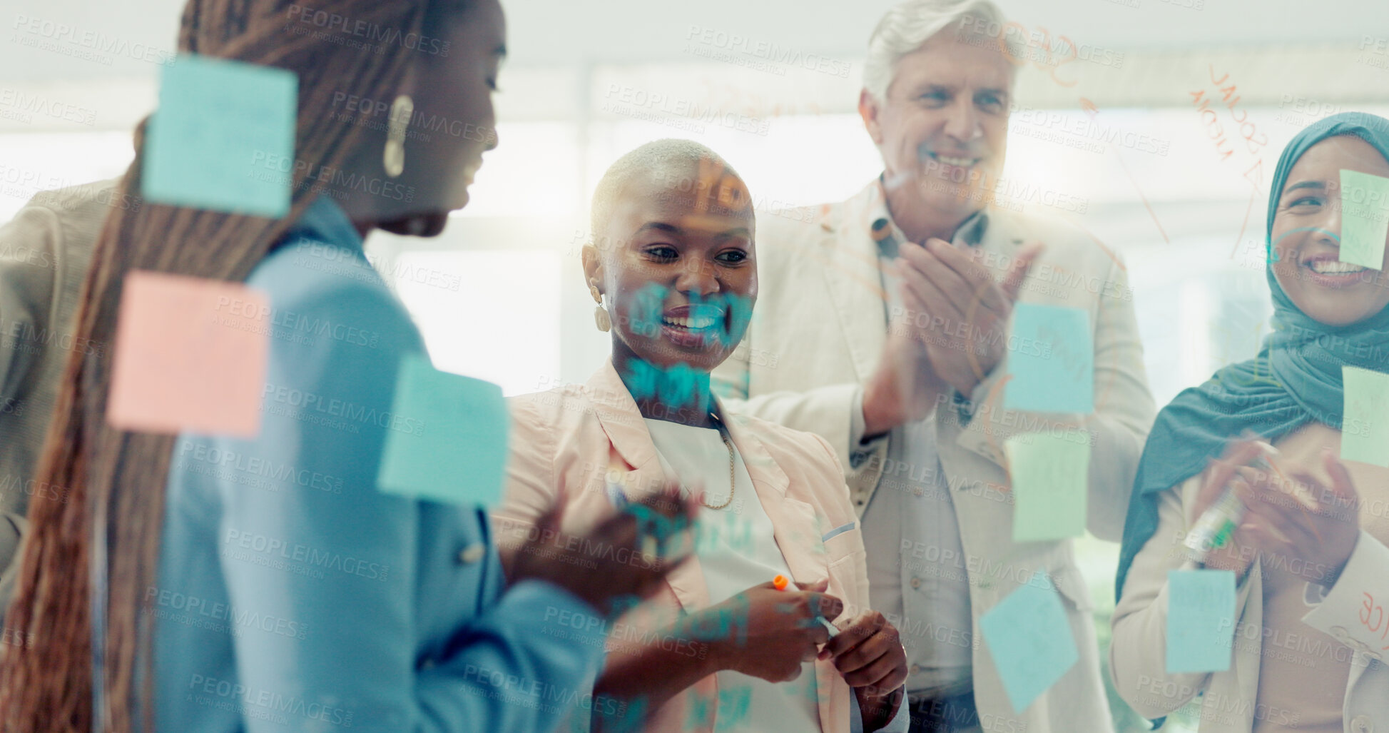 Buy stock photo Planning, success and sticky notes on glass in the office with a business team talking about an achievement. Meeting, applause and support with a black woman leader teaching her staff for motivation