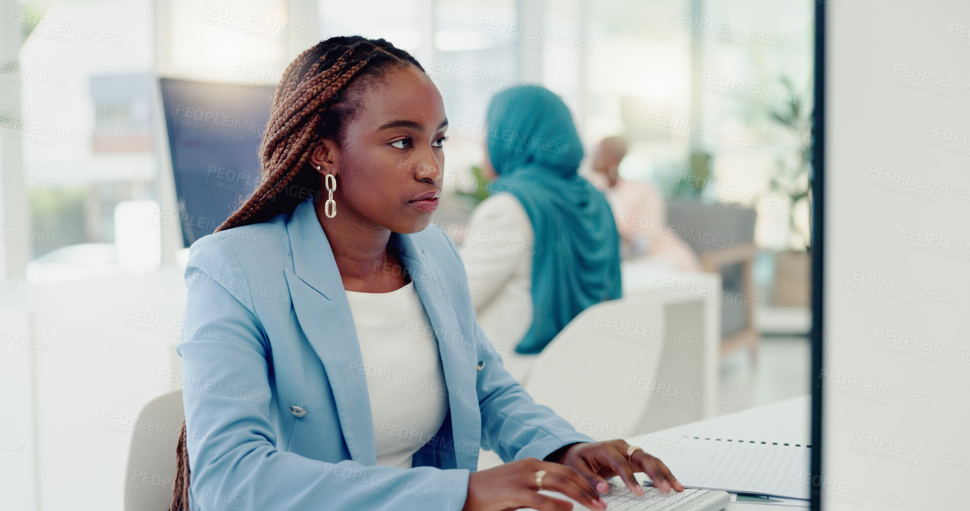 Buy stock photo African, business woman and typing report on computer in office and reading research, review or marketing strategy. Online, planning and employee with email, communication or project in Nigeria