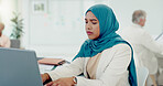 Muslim, business woman and typing on computer in office, startup company and digital management, internet planning and strategy review. Employee with islamic hijab working online for seo website tech