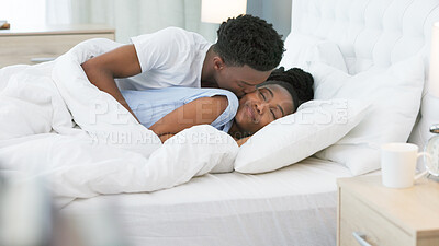 Kiss, bed and couple sleeping together in bedroom or waking up on weekend morning for luxury furniture, hotel or hospitality. Black people, woman or husband love, care and marriage for valentines day