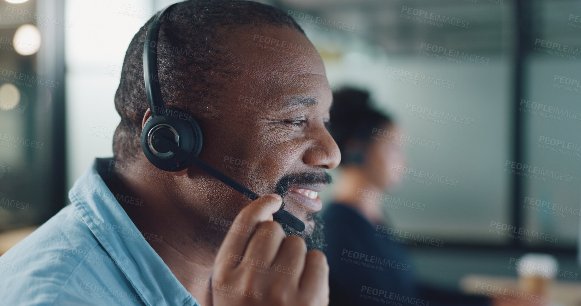 Buy stock photo Business man, call center and speaking, night communication or technical support for software solution. Happy african person, agent or consultant helping and advice at IT tech company or work agency