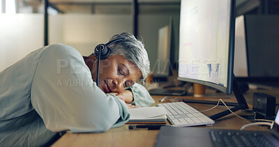 Buy stock photo Call center, burnout and sleeping senior woman tired while consulting for crm or contact us in office at night. Working late, fail or elderly consultant with fatigue or bored by customer support faq