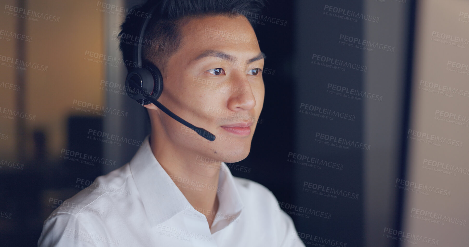 Buy stock photo Callcenter agent, night and face of Asian man with phone call, advice and headset in communication in dark office. Telemarketing, customer service or crm, help desk consultant for late support work.