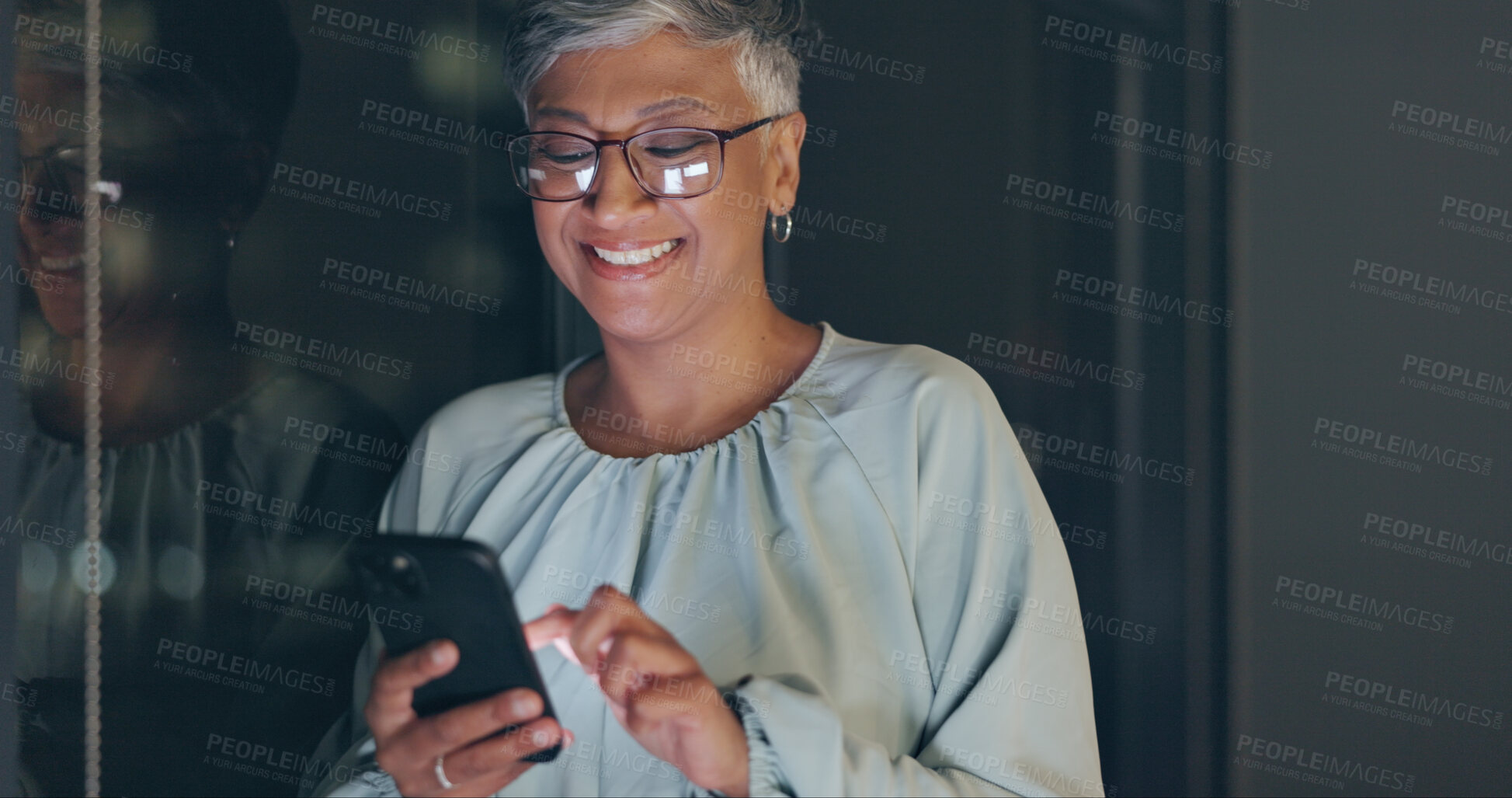 Buy stock photo Phone, night and senior woman with  business, typing and connection with digital app, mobile user and social media. Mature person, worker and employee with a smartphone, communication and post