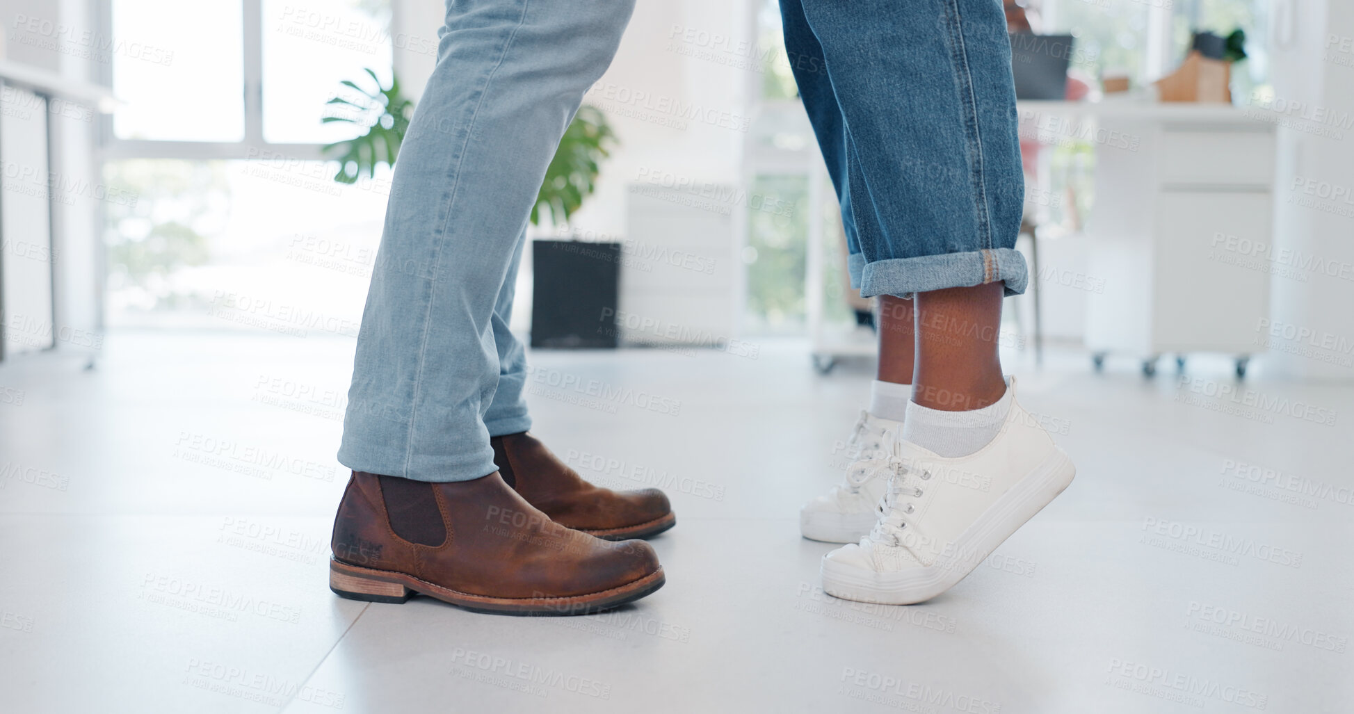 Buy stock photo Feet, tiptoe and shoes of couple on floor in home, living room or stretching in apartment with love or embrace. Sneakers, closeup and people standing together leaning and sharing romantic moment