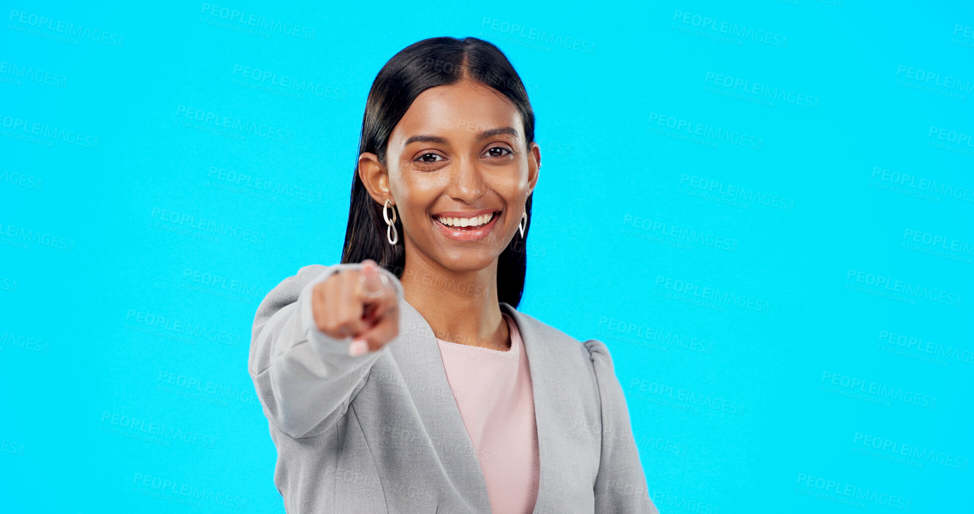 Buy stock photo Portrait, businesswoman in studio and pointing at you for recruitment, decision or choice in support. Smile, motivation and opportunity, woman with trust and opinion on inspiration on blue background