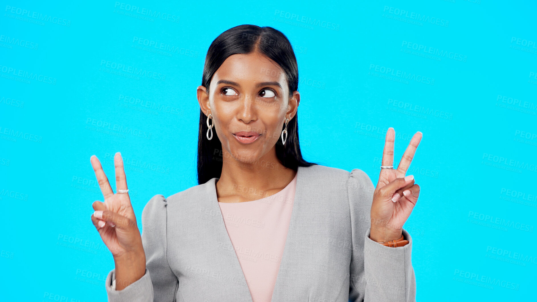 Buy stock photo Peace sign, business and happy Indian woman in studio for career, job and work opportunity. Professional, confidence and face of isolated person on blue background with pride, ambition and emoji
