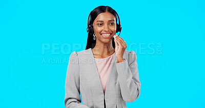 Buy stock photo Call center, customer support and face of Indian woman in studio for communication on blue background. Business, telemarketing mockup and happy person talking for crm service, help and online advice