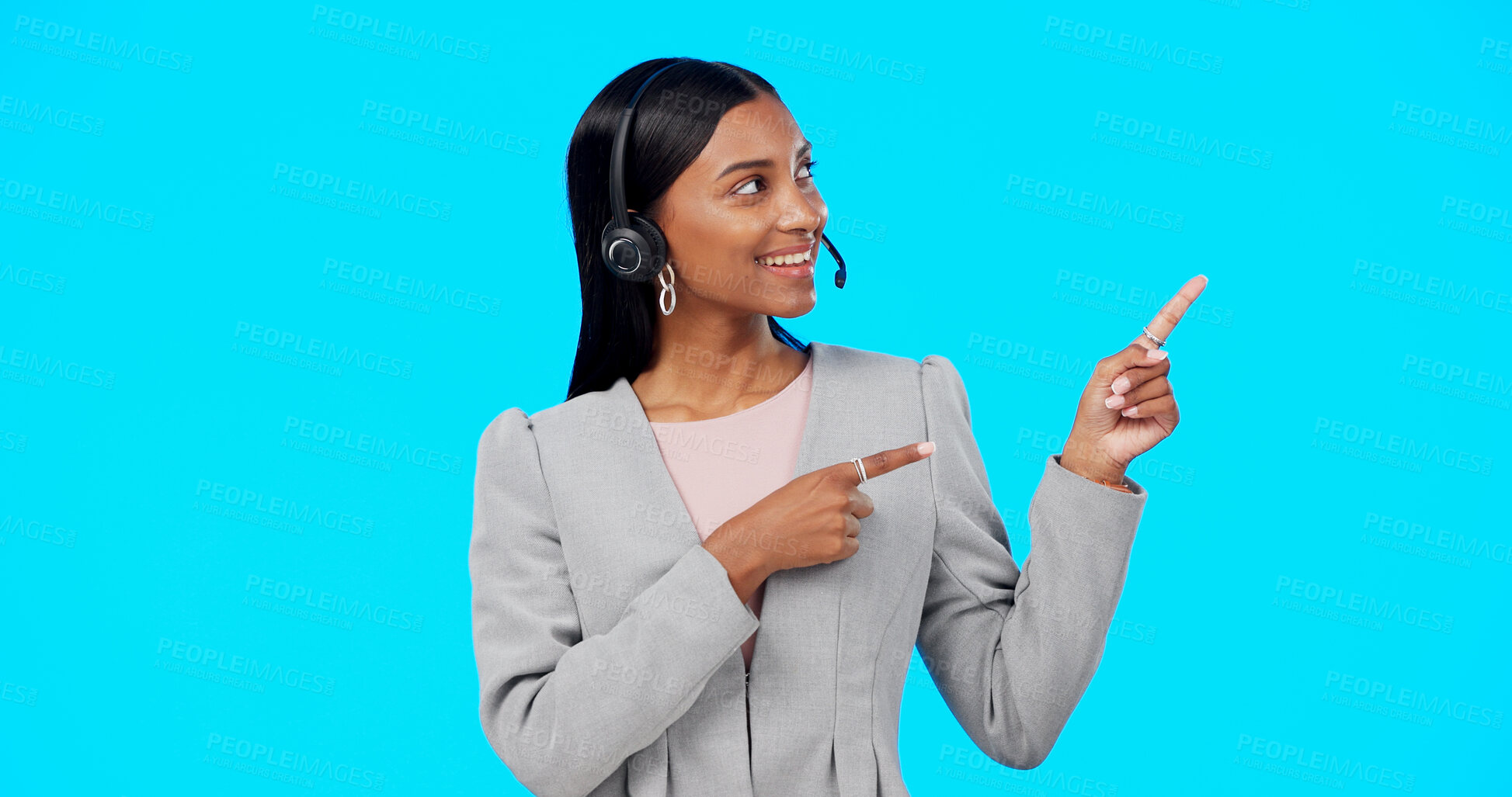 Buy stock photo Call center studio, professional happy woman or pointing at telemarketing info, company service choice or sales notification. Customer support info, contact us and consultant offer on blue background