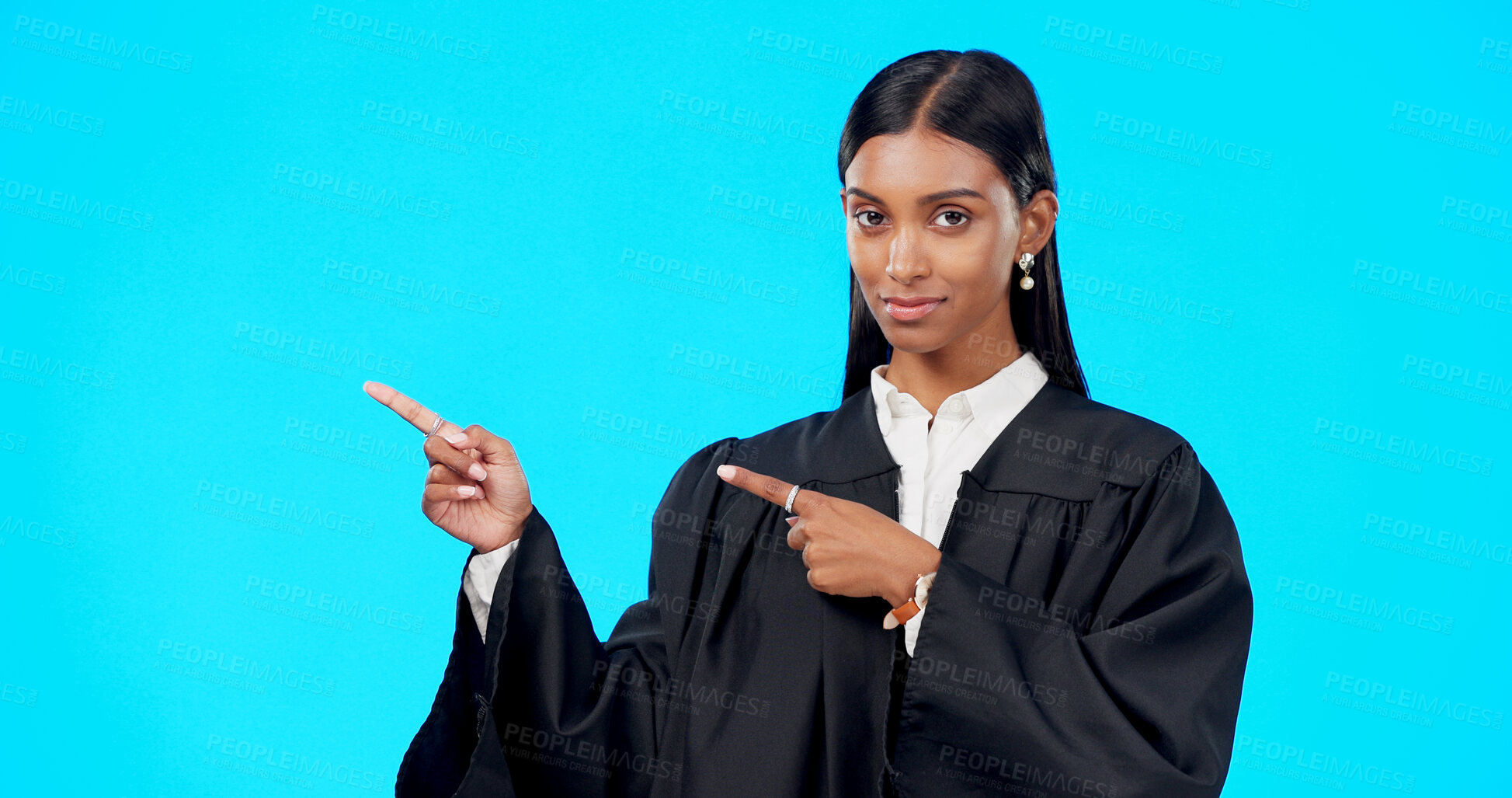 Buy stock photo Studio portrait, lawyer and woman point at legal offer, law firm promotion or government logo design, brand or advertising. Judge policy info, mockup space or attorney presentation on blue background