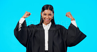 Woman, bicep muscle celebration and studio with excited face for legal victory for smile by blue background. Judge, lawyer or indina law expert in portrait to celebrate winning court case by backdrop