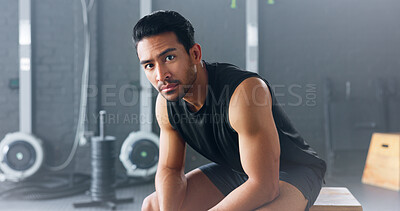 Buy stock photo Bodybuilder, portrait and man in gym thinking of fitness, training or healthy exercise and sports. Asian, athlete and serious motivation for wellness, goals or workout in club for mental health