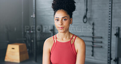 Exercise, motivation and portrait of black woman at the gym ready for workout. Smile, happy and female personal trainer in gymnasium for inspiration in sports, fitness and training for body wellness