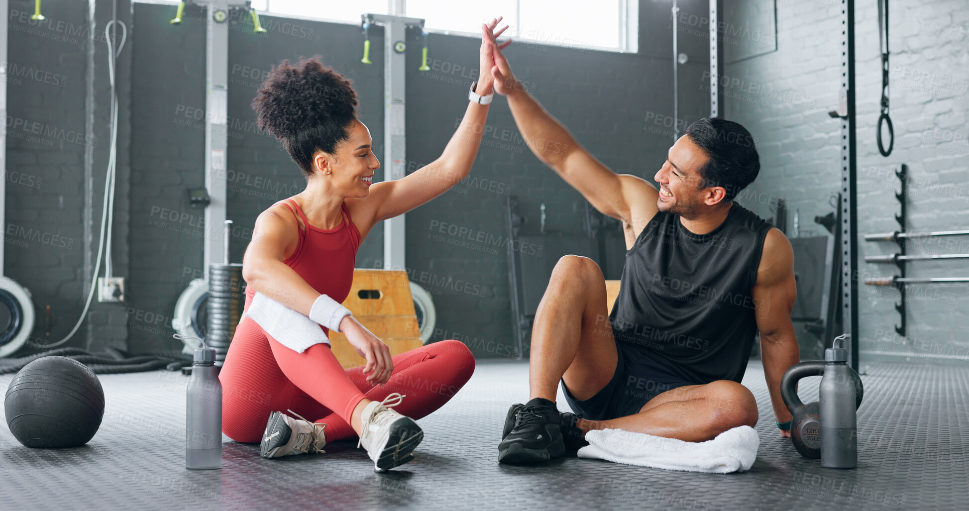 Buy stock photo Woman, man and high five for fitness, gym partnership and happy for growth, development or health on floor. Personal trainer, girl and success with smile, congratulations or motivation for mentorship