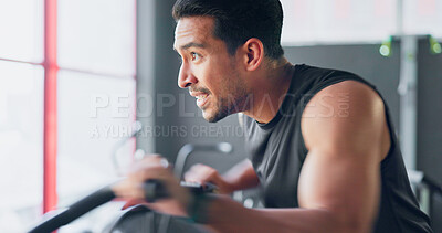 Buy stock photo Man, cycling and training in gym, fitness and motivation for health, wellness and weight loss. Strong indian athlete, training and exercise for triathlon by cardio, sports and endurance or determined