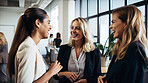 Business woman, friends and laughing for funny joke, meme or talking together at the office. Happy group of employee women laugh for fun comedy, chat or social talk in team building at the workplace