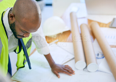 Buy stock photo Blueprint, architect and black man in office with paper, design and creative, building and planning. Construction, engineer and male project manager with plan for property, model or renovation