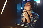 Radio dj, presenter and woman in a sound production studio taking a pray break at work. Headphones, recording and working female employee ready for discussion on air for web podcast and music