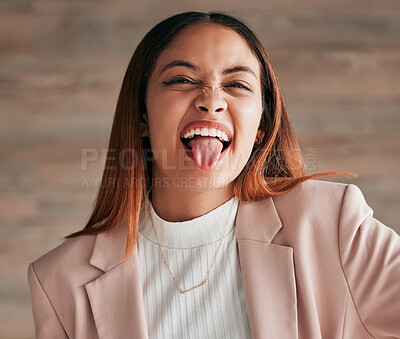 Buy stock photo Portrait, tongue and funny face with a woman on a wooden background in studio for comedy, humor or a joke. Comic, crazy and goofy with an attractive young female acting carefree, playful or silly