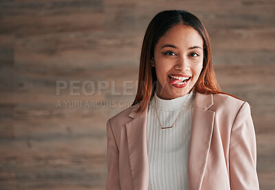 Buy stock photo Happy, portrait and woman with her tongue out by a wall with a positive, goofy and confident mindset. Happiness, excited and headshot of a young female model fro Mexico with a silly face expression.