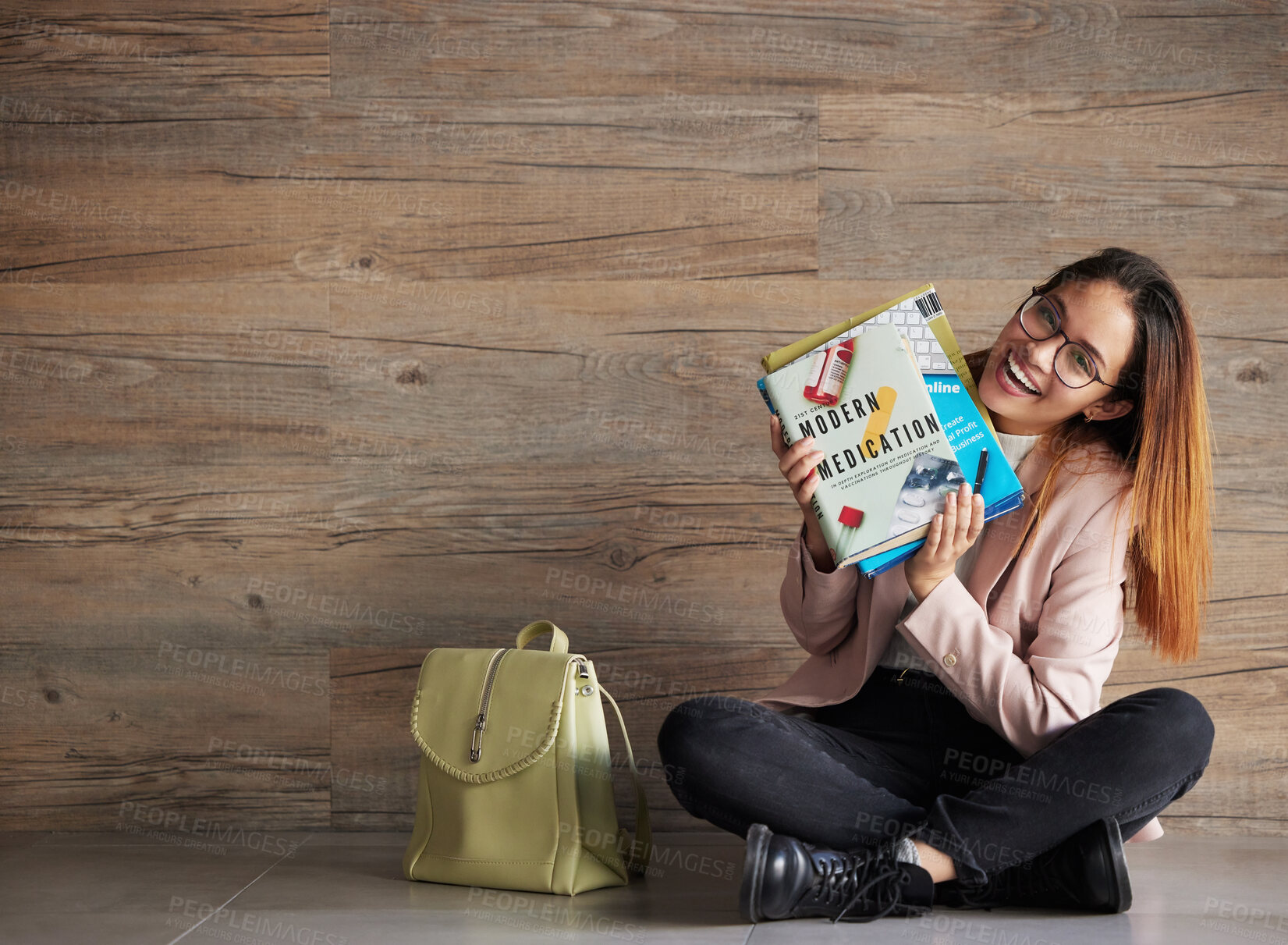 Buy stock photo University, happy woman with books sitting in hallway and mock up with education at medical college. Information, knowledge and mockup, student on floor with smile and library book to study medicine.